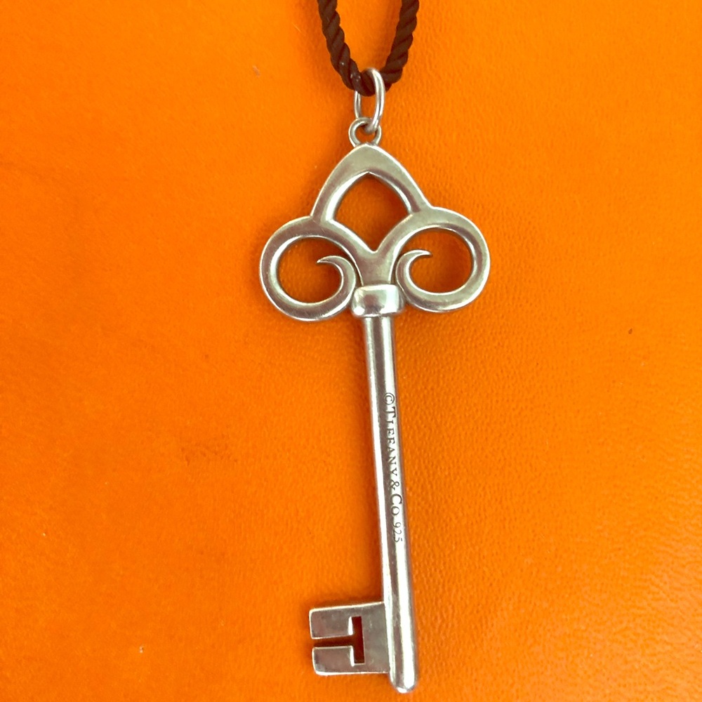 Tiffany 2.5” key with long black woven necklace